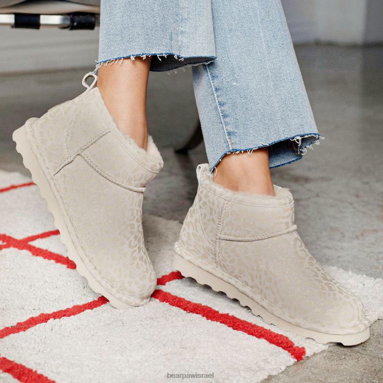 BEARPAW נשים שורט אקזוטי XB6J33 מגפיים נצנצים לבנים חורפיים